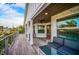 Spacious covered porch with ample seating, perfect for entertaining and relaxing at 5708 Holmes Blvd, Holmes Beach, FL 34217