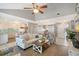 Bright and airy living room connects to the kitchen, creating an inviting and social space at 6684 Easton Dr, Sarasota, FL 34238