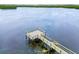 Aerial view of the community fishing pier, perfect for enjoying tranquil waters and scenic views at 803 Audubon Dr # 803, Bradenton, FL 34209