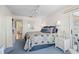 Tastefully decorated bedroom with a comfortable bed and ample storage at 803 Audubon Dr # 803, Bradenton, FL 34209