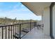 A glass topped dining table with seating and outdoor views at 1001 Beach Rd # A203, Sarasota, FL 34242