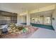 Elegant lobby with indoor garden at 1001 Beach Rd # A203, Sarasota, FL 34242