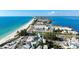 Beautiful aerial view of coastal community and its pristine beach on a sunny day at 1011 68Th W Ave, Bradenton, FL 34207