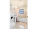 Cozy bathroom features a pedestal sink, bath tub, and mosaic tile at 1011 68Th W Ave, Bradenton, FL 34207