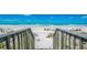 Picturesque beach view with white sand and inviting chairs for relaxation at 1011 68Th W Ave, Bradenton, FL 34207