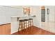 Cozy breakfast bar with three stools, perfect for casual dining and conversation at 1011 68Th W Ave, Bradenton, FL 34207