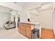Bright kitchen with a breakfast bar, stainless steel appliances, and an open layout perfect for entertaining at 1011 68Th W Ave, Bradenton, FL 34207