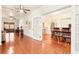 Spacious living room showcasing an open floor plan leading to the dining area at 1011 68Th W Ave, Bradenton, FL 34207