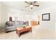 Open living area with a view to the kitchen bar area at 1011 68Th W Ave, Bradenton, FL 34207