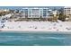 Breathtaking view of the beach from the luxury condominium building, a serene coastal scene at 1035 Seaside Dr # 603, Sarasota, FL 34242