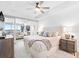 Bright bedroom featuring contemporary design and access to living space and beach views at 1035 Seaside Dr # 603, Sarasota, FL 34242