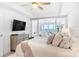 Bright bedroom featuring contemporary design and access to living space and beach views at 1035 Seaside Dr # 603, Sarasota, FL 34242