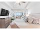 Bright bedroom featuring contemporary design and access to living space at 1035 Seaside Dr # 603, Sarasota, FL 34242