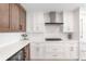 Well-equipped kitchen featuring stainless steel appliances and sleek white countertops at 1035 Seaside Dr # 603, Sarasota, FL 34242