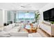 Bright living room with modern furnishings, scenic views, and stylish decor at 1035 Seaside Dr # 603, Sarasota, FL 34242