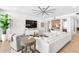 Comfortable living room with modern decor, large windows, and plenty of natural light at 1035 Seaside Dr # 603, Sarasota, FL 34242