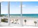 A stunning view of the beach and ocean from the windows showing the beautiful coastline at 1035 Seaside Dr # 603, Sarasota, FL 34242