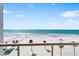 Breathtaking ocean view from the balcony, showcasing a tranquil beachside escape at 1035 Seaside Dr # 603, Sarasota, FL 34242