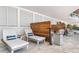 Seaside patio featuring multiple lounge chairs and decorative wood accents at 1035 Seaside Dr # 603, Sarasota, FL 34242