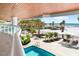 Luxury pool with beach view and plenty of lounge chairs for residents to enjoy at 1035 Seaside Dr # 603, Sarasota, FL 34242