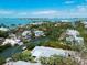 Prime waterfront real estate with a pool, mature trees, and a serene canal view at 110 Faubel St, Sarasota, FL 34242