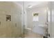 This bathroom features tiled walls and a glass shower enclosure at 110 Faubel St, Sarasota, FL 34242