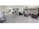 Large sun room featuring tiled floors and comfortable seating at 110 Faubel St, Sarasota, FL 34242