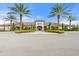 Stunning clubhouse with desert landscaping and palm trees in a beautiful community at 11127 Devonbridge Dr, Palmetto, FL 34221