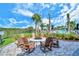 Outdoor fire pit with comfortable seating area for relaxing with friends and enjoying the view at 12370 Marsh Pointe Rd, Sarasota, FL 34238
