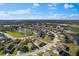 Aerial view of a neighborhood highlighting the home's location and surrounding community amenities at 13065 Bliss Loop, Bradenton, FL 34211