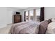 Cozy bedroom with plush bedding, and natural light at 13065 Bliss Loop, Bradenton, FL 34211
