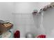 Walk-in closet with wire shelving that is partially filled with belongings at 13065 Bliss Loop, Bradenton, FL 34211