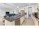 Spacious kitchen island featuring stainless steel appliances, ample storage and a built-in dishwasher at 13065 Bliss Loop, Bradenton, FL 34211