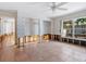 Large primary bedroom features a window with tropical views and 2 large closet spaces at 1374 Moonmist Dr # B1, Sarasota, FL 34242