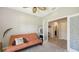 Cozy space with daybed, closet and access to bathroom and walk-in closet at 15008 Trinity Fall Way, Bradenton, FL 34212