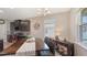 Bright dining area showcases decorative lighting and easy access to the kitchen space at 15008 Trinity Fall Way, Bradenton, FL 34212