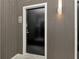 Modern front door with sidelight and interesting texture at 1990 Main St # 10, Sarasota, FL 34236