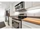 Kitchen features stainless steel appliances and modern design at 1990 Main St # 10, Sarasota, FL 34236