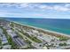 Scenic aerial view of the beachside community highlighting parking and buildings near the beach at 2350 N Beach Rd # 1A, Englewood, FL 34223