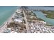 Aerial view of a coastal community with a mix of residential and commercial properties at 2350 N Beach Rd # 1A, Englewood, FL 34223