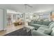 Airy living room with hardwood floors, telescope and ocean view at 2350 N Beach Rd # 1A, Englewood, FL 34223