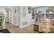 Cozy seating area with built-in bookshelves and a telescope at 2350 N Beach Rd # 1A, Englewood, FL 34223