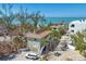 Coastal neighborhood with beach houses and lush vegetation near the water at 2350 N Beach Rd # 1B, Englewood, FL 34223