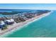 Expansive aerial view of beachfront property with turquoise water and sandy shoreline at 2350 N Beach Rd # 1B, Englewood, FL 34223