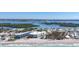 Aerial view of beach community near waterway with a scenic bridge at 2350 N Beach Rd # 1B, Englewood, FL 34223