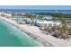 Aerial view of beachside condos and beach with white sands at 2350 N Beach Rd # 1B, Englewood, FL 34223