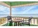 Balcony view showcasing stunning ocean scenery and clear blue skies at 2350 N Beach Rd # 1B, Englewood, FL 34223