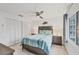 Comfortable bedroom features a queen bed, neutral tones, and plenty of closet space at 2350 N Beach Rd # 1B, Englewood, FL 34223