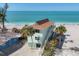Charming beach house with beautiful ocean views and palm trees at 2350 N Beach Rd # 1B, Englewood, FL 34223