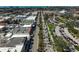 Aerial view of a commercial strip highlighting the proximity to restaurants and shops, offering convenience at 244 Saint Augustine Ave # 905, Venice, FL 34285